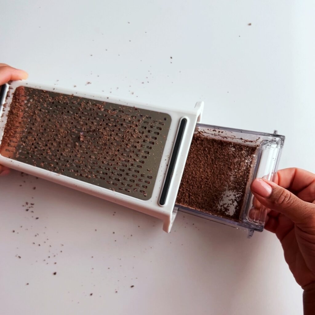grated cocoa in a box grater pull out drawer