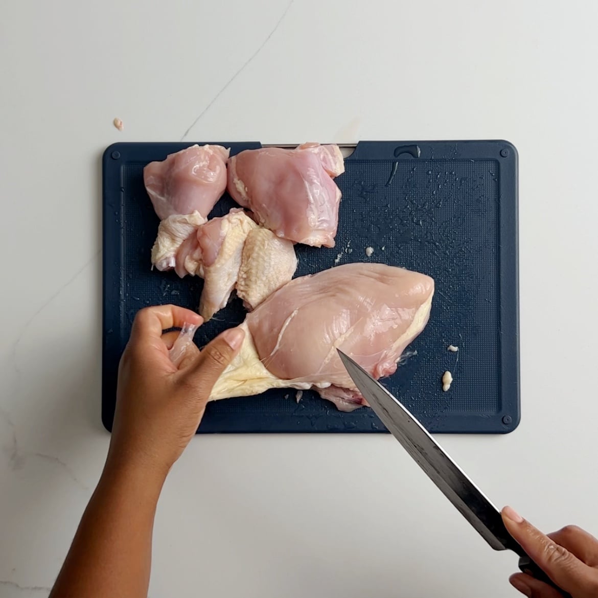 Removing the skin from chicken breasts