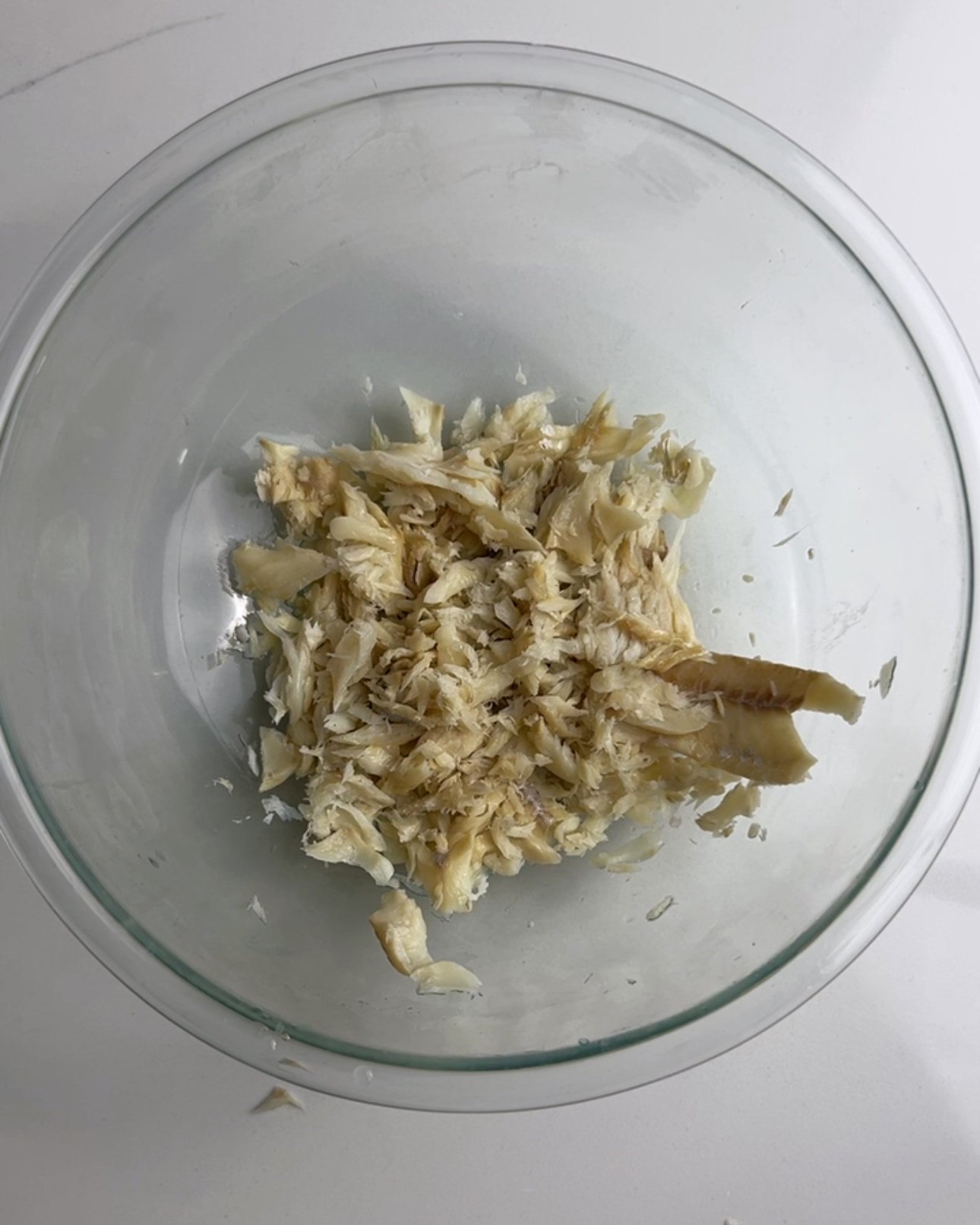 flaked salt fish in a bowl