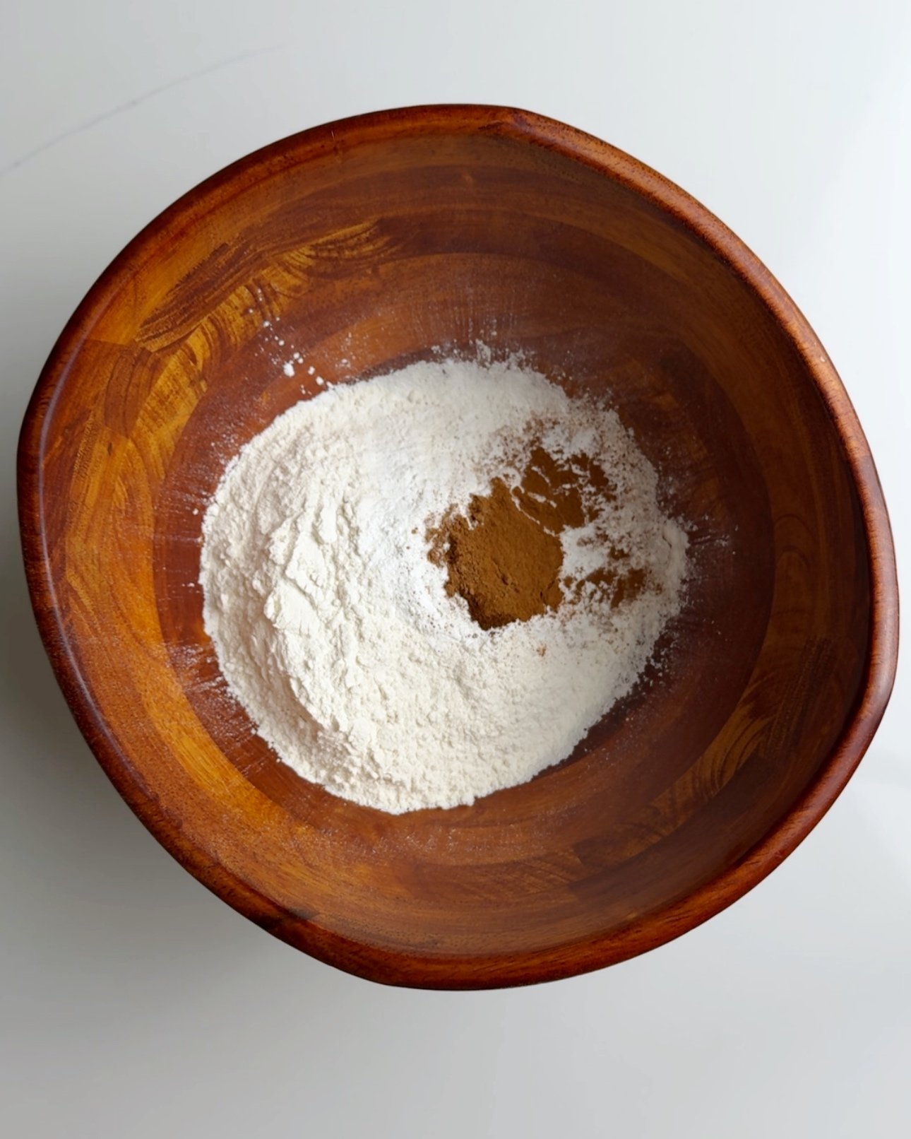 Dry ingredients for soft mithai in a wooden bowl