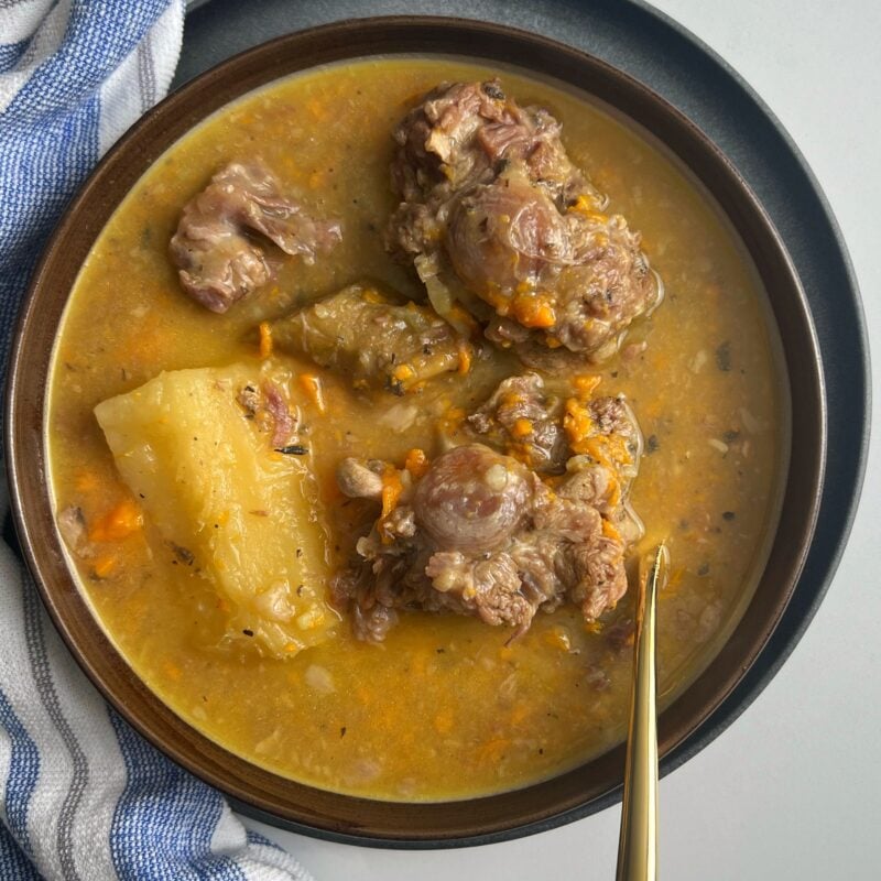 close up view of a bowl of oxtail soup