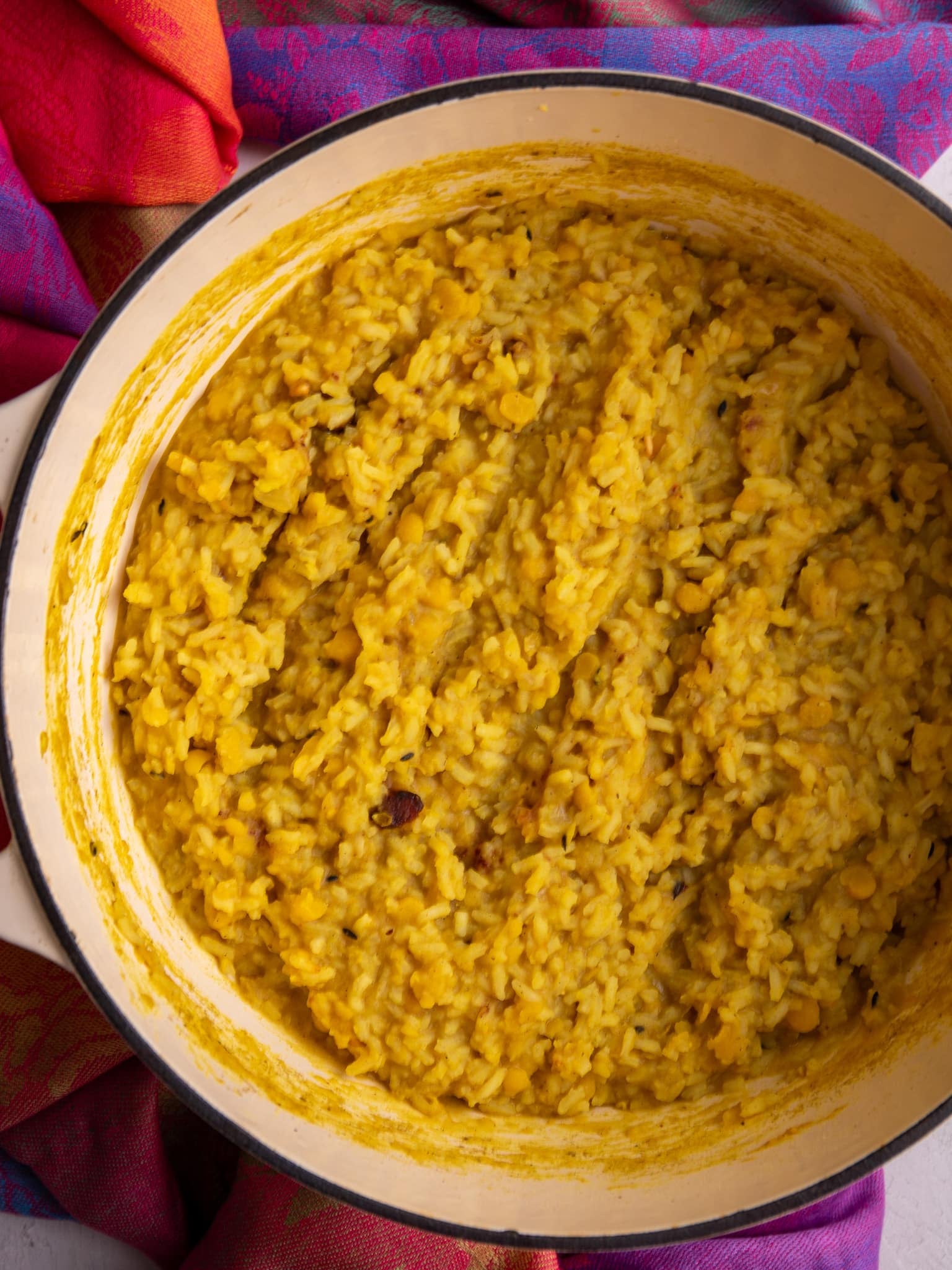 Close-up of Guyanese kitchri showing soft rice and split peas cooked together.