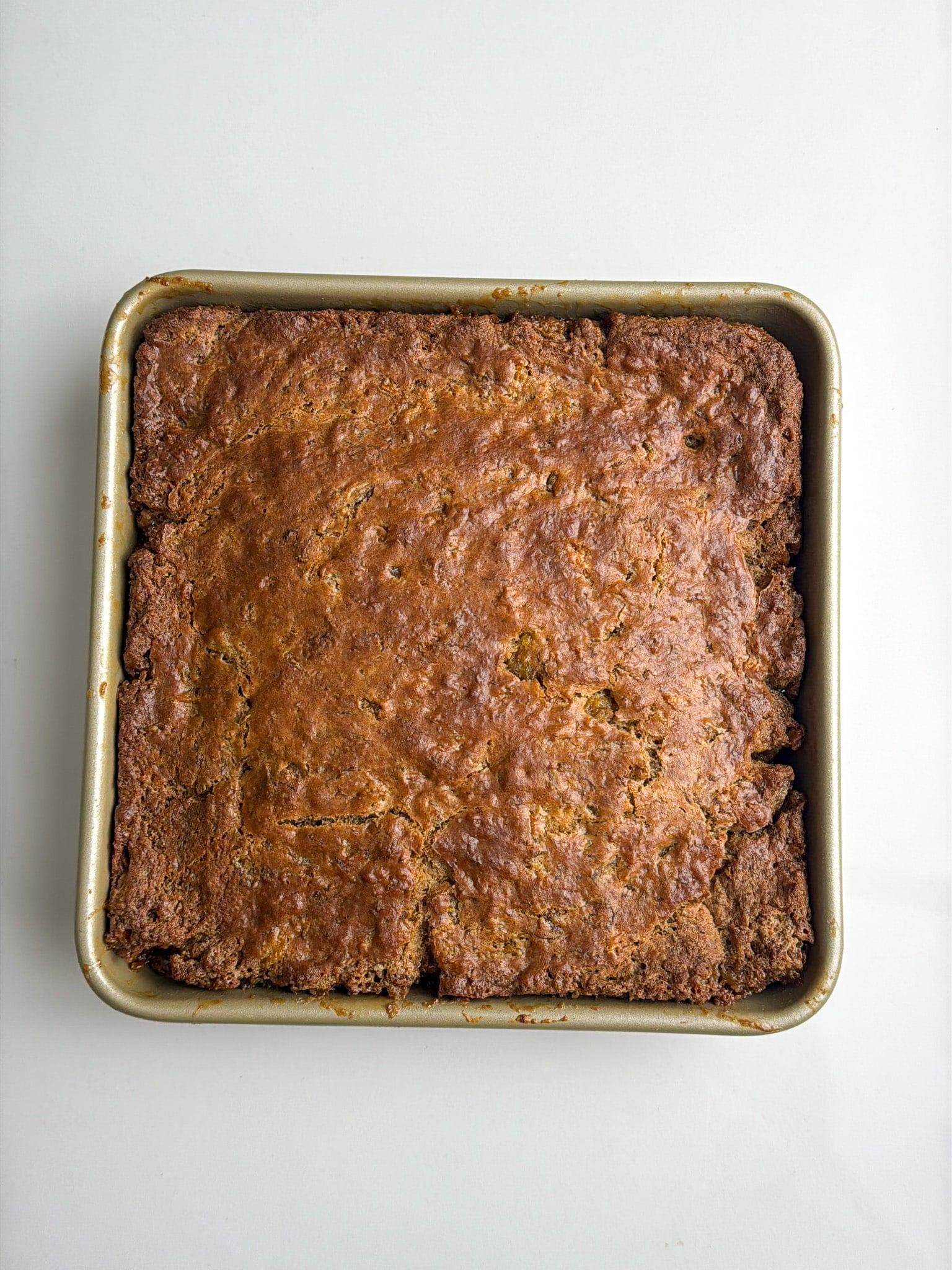 Baked plantain bread still in the pan.