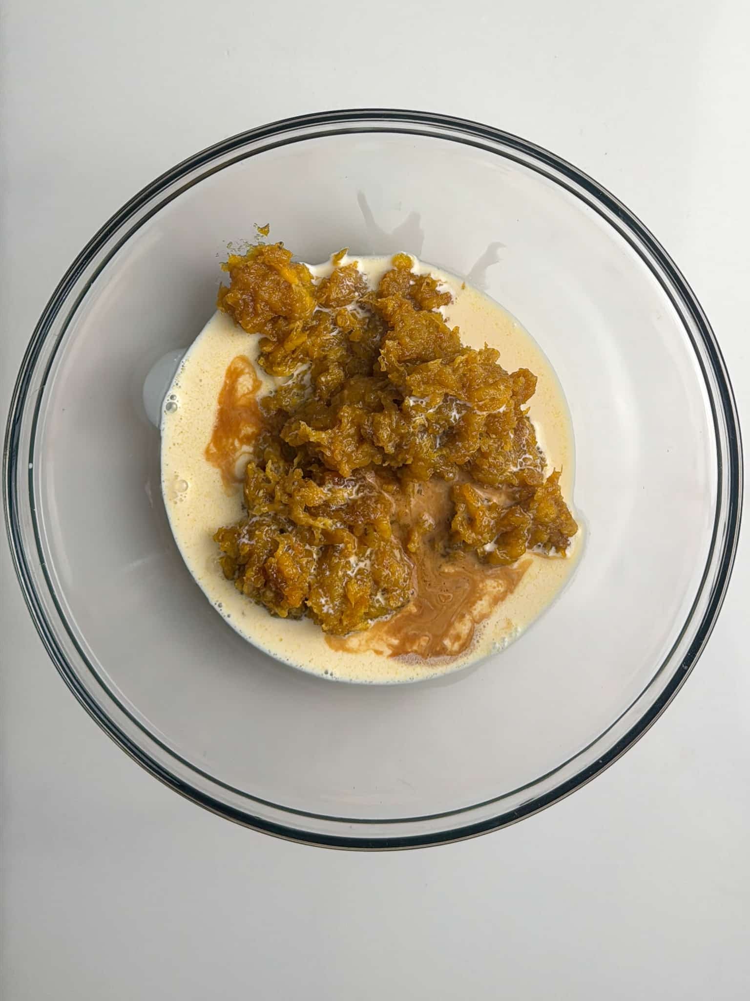 Cooked plantains with butter and brown sugar in a bowl.