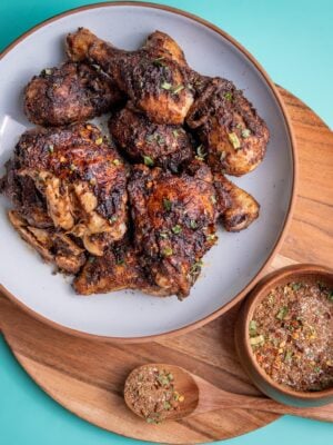 Jamaican jerk seasoning dry rub on baked chicken thighs and drumsticks